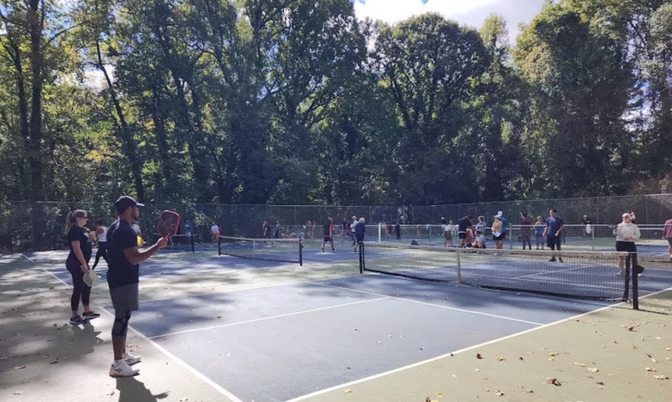 Doubles pickleball match in progress